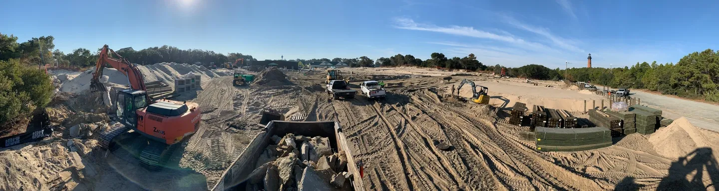 A picture of the construction area with vehicles
